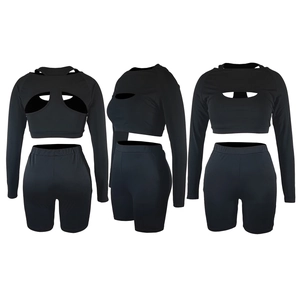 Ghost mannequin view of black 3-piece sports set with cutout long sleeve and high waist shorts