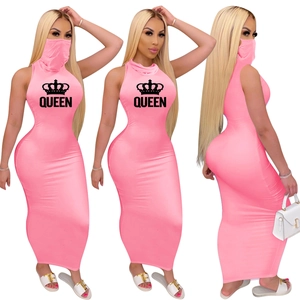 Detail of pink bodycon maxi dress featuring a built-in face mask and crown Queen print