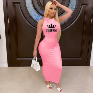 Detail of the hot pink bodycon maxi dress with a black crown and QUEEN graphic print