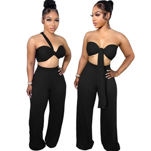 Ensemble 2 pièces noir pour femme avec haut licou modulable et pantalon large à taille haute