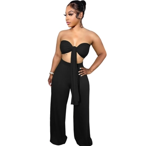 Ensemble noir deux pièces pour femme avec haut bandeau dos nu et pantalon large taille haute