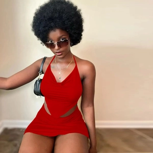 Detail of red two-piece set featuring halter neck top with V-cut waist and mini skirt