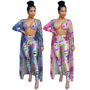 Three-piece floral print set with halter top, high-waist pants and long cardigan cover-up