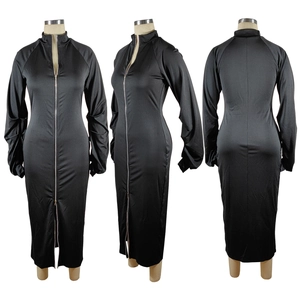 Detail view of black bodycon dress featuring full-length metal zipper and ruched sleeves