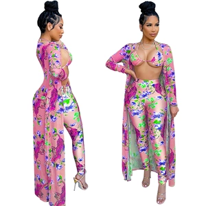 Three-piece women's swimwear set with tiger print cardigan and high-waist trousers
