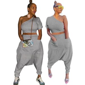 Women's two-piece cotton lounge set featuring a one-shoulder crop top and harem pants