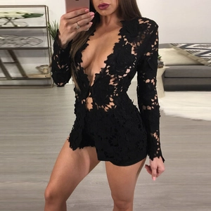 Detail of black floral lace fabric on deep V-neck long sleeve romper with sheer finish