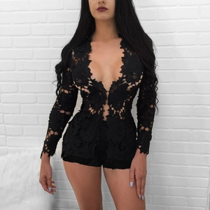 Detail of elegant black lace texture and floral embroidery on women's two-piece set