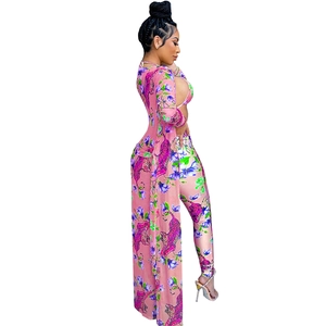 Detailed close-up of tiger floral print beachwear 3-piece set with long cover-up and pants