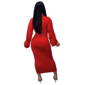 Detailed back view of a slim fit red maxi dress with ruched sleeves and long hemline