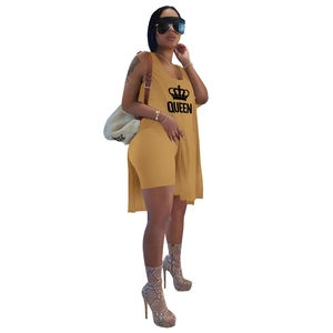 Detail of mustard yellow Queen print long tank top and biker shorts two-piece set