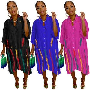 Women's loose shirt dress with colorful vertical print stripes and two big front pockets