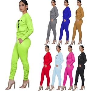 Women's two-piece tracksuit with faith print top and ruched joggers in multiple colors