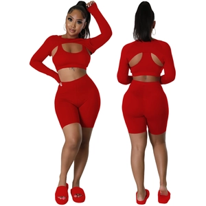 Detailed front and back view of a red three-piece athletic set with bolero and shorts