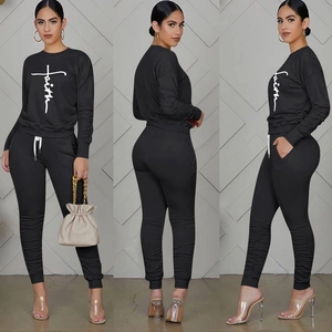 Close-up detail of the Faith printed sweatshirt and shirred joggers two-piece set for women