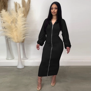Detail of front silver double zipper and ruched sleeves on the black bodycon maxi dress