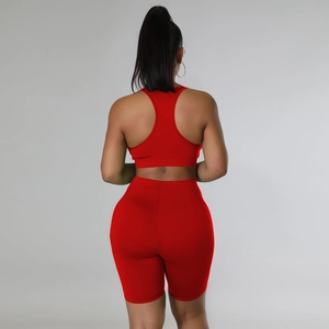 Rear view of red two-piece workout set with racerback sports bra and high waist shorts