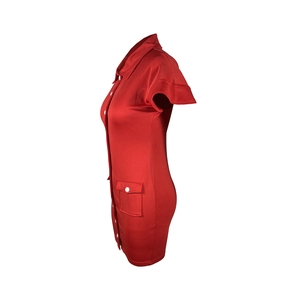 Detail of red slim fit dress with contrast buttons and decorative side flap pocket