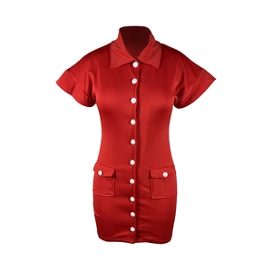 Close-up of red short sleeve dress featuring white buttons and functional flap pockets