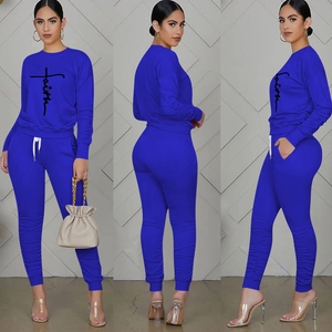 Three-way view of blue Faith print lounge set with cuffed sleeves and pleated drawstring pants