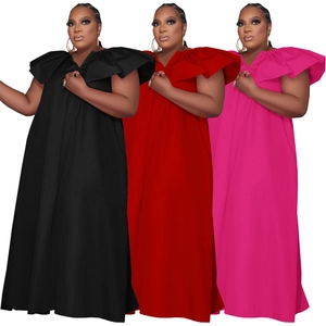 Plus size V-neck maxi dress with dramatic ruffle shoulders in black, red and pink colors