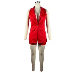 Detail of red sleeveless blazer vest with notched lapel and matching shorts set for women