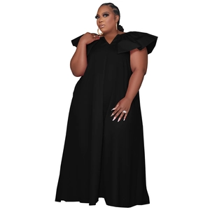 Close-up of elegant V-neckline and dramatic ruffle details on this black plus size maxi dress