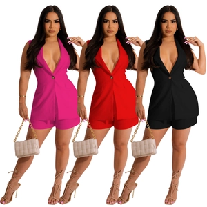 Women's sleeveless V-neck blazer vest and matching shorts set in pink, red, and black