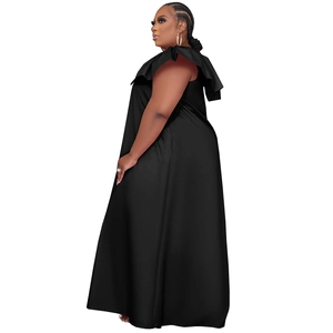 Detail of plus size black sleeveless maxi dress with elegant ruffle V-neck and flowing hem