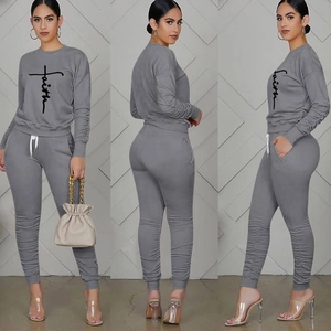 Front, side, and back view of grey jogger set with faith print and drawstring details