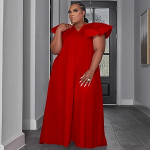 Close-up of vibrant red plus size maxi dress featuring tiered ruffles and V-neckline