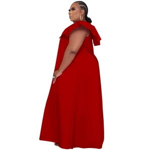 Detail of elegant red plus size sleeveless dress featuring large ruffle V-neck and maxi hem