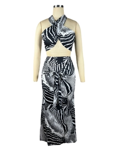 Detail of two-piece set with black and white abstract print tube top and fishtail skirt
