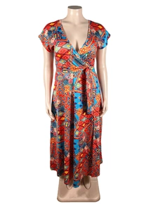 Close-up of vibrant floral print and wrap V-neck detail on a short sleeve maxi dress