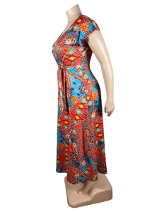 Detail view of colorful tropical print maxi dress with matching waist belt and A-line silhouette