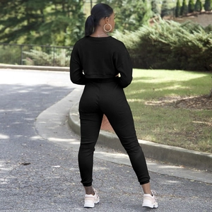 Set loungewear in maglia a coste elasticizzata con top a maniche lunghe e pantaloni