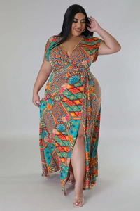 Detail view of V-neck plus size maxi dress with vibrant geometric print and high side slit