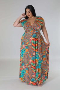 Detail of V-neck plus size maxi dress with vibrant geometric and floral print patterns