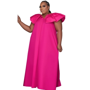 Detail of V-neckline and large ruffle flounce sleeves on magenta plus size maxi dress