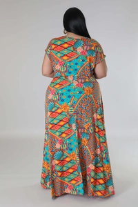Detail view of colorful Bohemian print on plus size maxi dress with high waist design