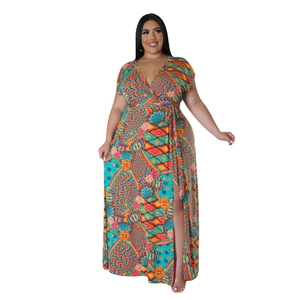 Close-up of vibrant bohemian floral print and waist tie detail on V-neck maxi dress