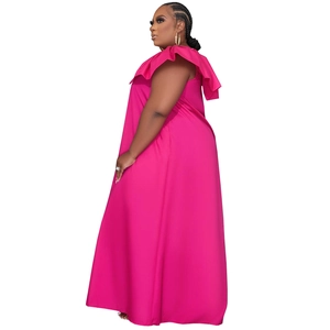 Detail of ruffled V-neck and backline on a rose pink sleeveless flowy maxi dress
