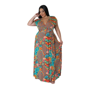 Plus size V-neck maxi dress with vibrant floral geometric print and waist belt