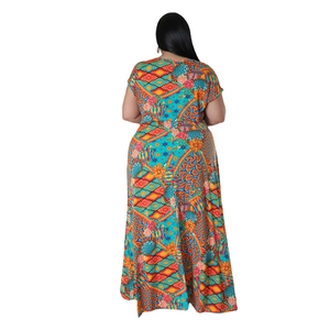 Plus size bohemian long dress with vibrant geometric floral print and short sleeves