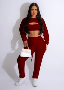 Detailed close-up of ribbed texture on burgundy three-piece lounge set with cutout