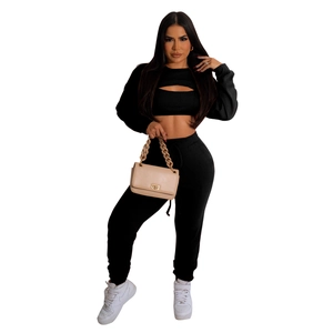 Women's 3-piece ribbed lounge set featuring black long sleeve crop top, vest and pants