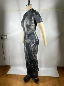 Detailed side view of tight-fitting maxi dress with marble print and ribbed texture