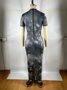 Detail view of the back zipper and slit on a slim fit marble tie-dye ribbed midi dress
