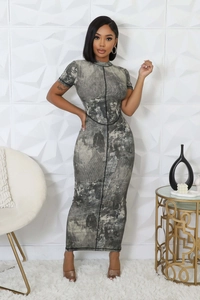 Detail of grey marble print rib-knit dress featuring contrast black stitching on seams