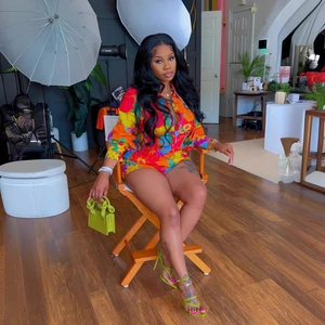 Women's floral print two-piece set featuring long sleeve shirt and matching shorts